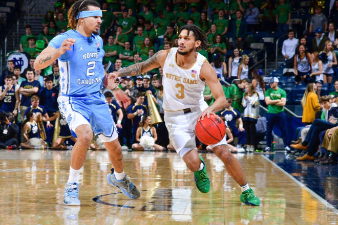 Prentiss Hubb's team highs of 20 points and eight  assists helped Notre Dame rally to a dramatic  77-76 victory versus Cole Anthony's Tar Heels.