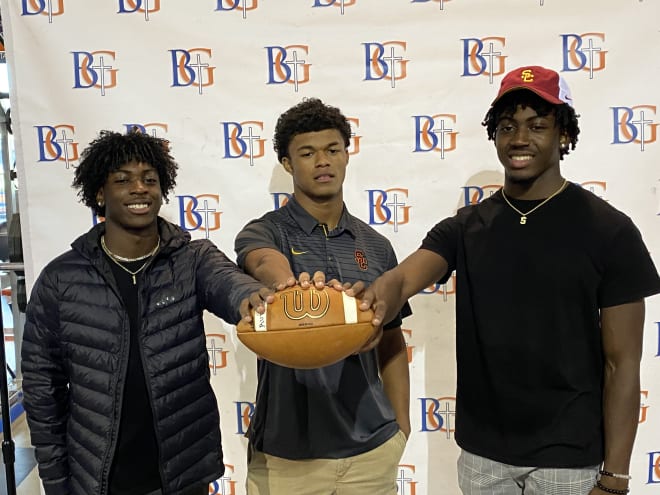 Branch with teammate and fellow USC signee Fabian Ross, middle, and younger brother Zachariah Branch.
