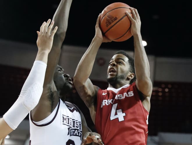 Daryl Macon was hit with a questionable traveling call with 8 seconds remaining in the game
