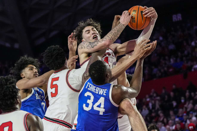 Georgia's Jusaun Holt fights for a rebound with Kentucky's Oscar Tshiebwe (34) during Saturday's game in Athens.