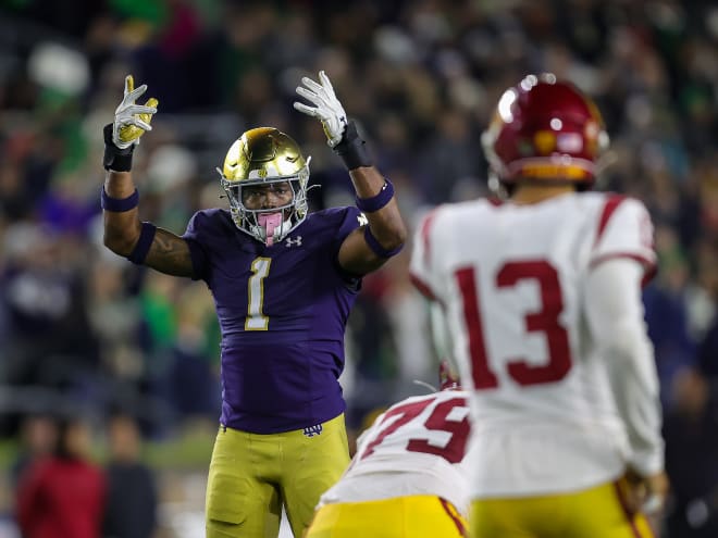 Notre Dame defensive end Javontae Jean-Baptiste (1) asks the crowd to make noise against USC.