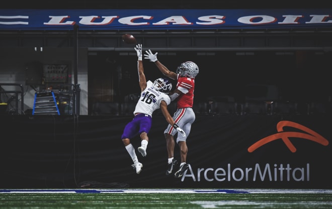 Brandon Joseph leaps to pick off a pass in the end zone intended for Garrett Wilson.