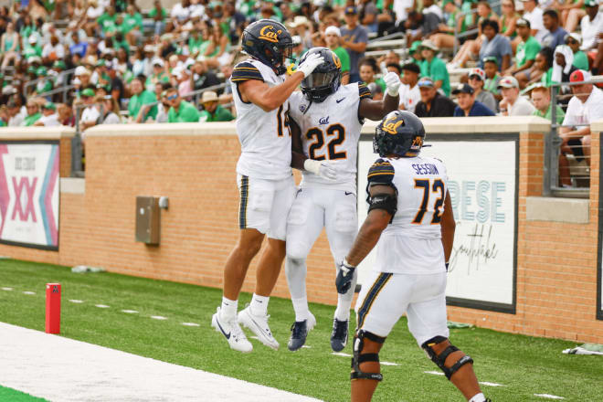 Cal running back Isaiah Ifanse (22) finished his Bears debut with 3 rushing touchdowns Saturday.