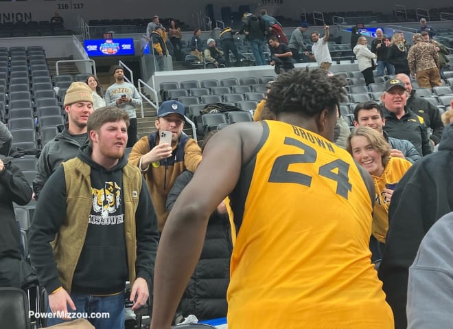 Kobe Brown celebrates with Missou fans after Missou wins Illinois and scores career-high 31 points