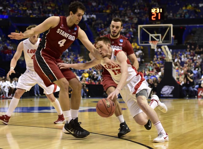 Former New Mexico guard Craig Neal drives to the basket against Stanford in the 2014 NCAA tournament. Neal, who has two seasons of eligibility remaining, will take an official visit to Ole Miss beginning Thursday.