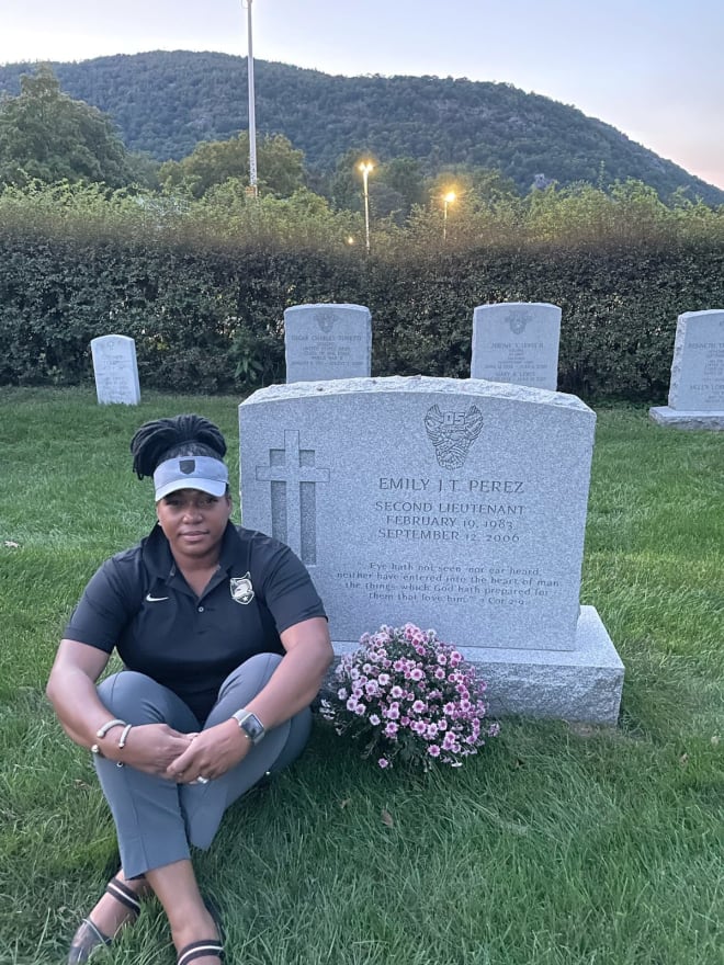 Tracey Lloyd, West Class of 2003 (Tracey Lloyd, West Class of 2003) at the gravesite of friend and former teammate (2005), Emily Perez