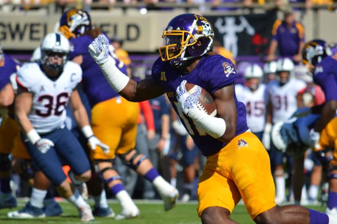 East Carolina running back James Summers finds room to run in ECU's 41-3 won over Connecticut.