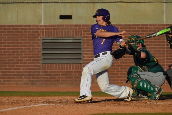 ECU's Wesley Phillips nails a hard hit home run on this swing in ECU's 8-1 Victory over George Mason
