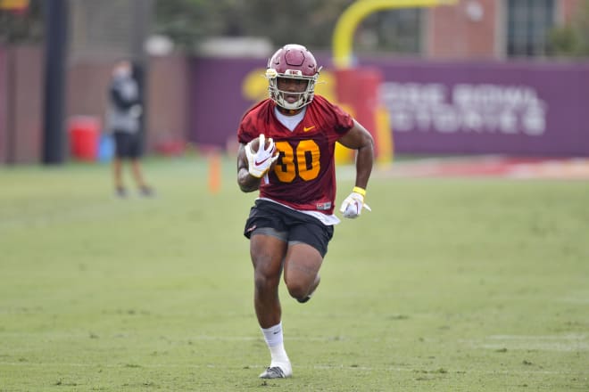 Running back Markese Stepp is said to be looking good in his return from left ankle surgery, as he shows here Saturday.