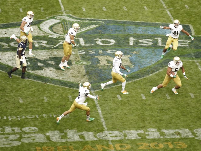 Notre Dame linebacker Manti Te'o, front right, accounted for two of Navy's turnovers against the Irish in 2012.