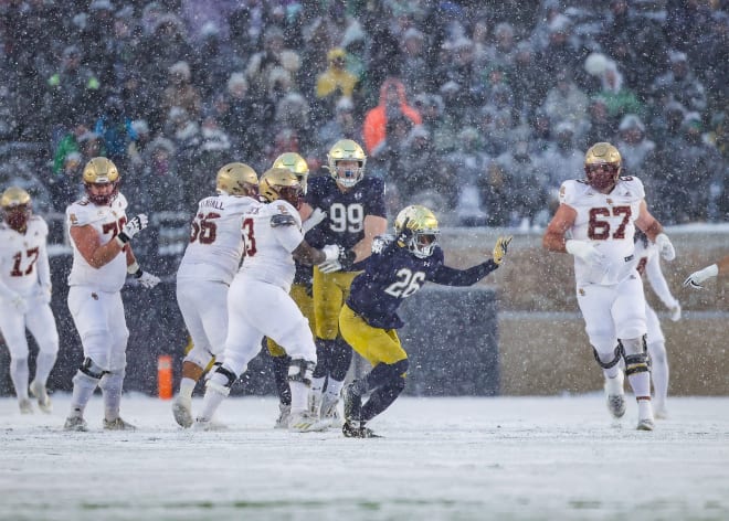 Notre Dame safety Xavier Watts (26 before switching to 0 this spring) celebrates a big play against Boston College last November.