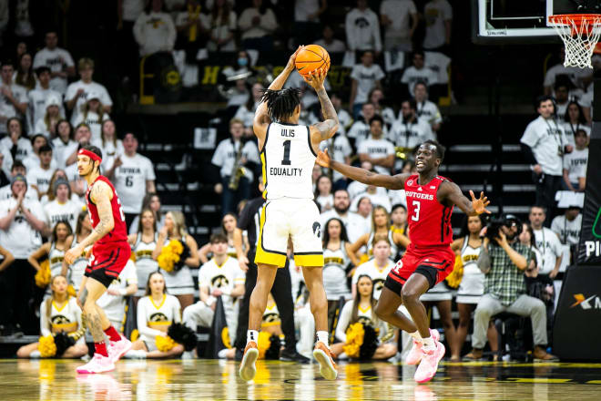 Ahron Ulis hits a three-pointer in the first half of the 93-82 win over Rutgers on Sunday. © Joseph Cress/Iowa City Press-Citizen / USA TODAY NETWORK