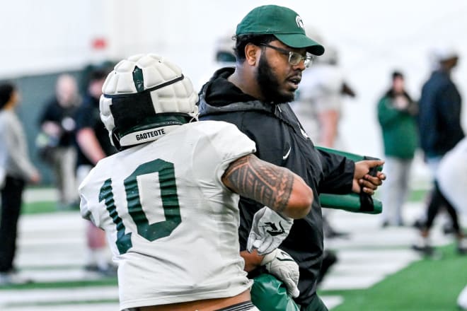 Brandon Jordan trains with Ma'a Gaoteote during practice