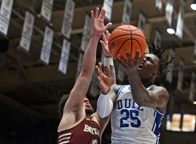 Duke's Mark Mitchell, right, goes up against BC's Jaeden Zackery on Saturday. 