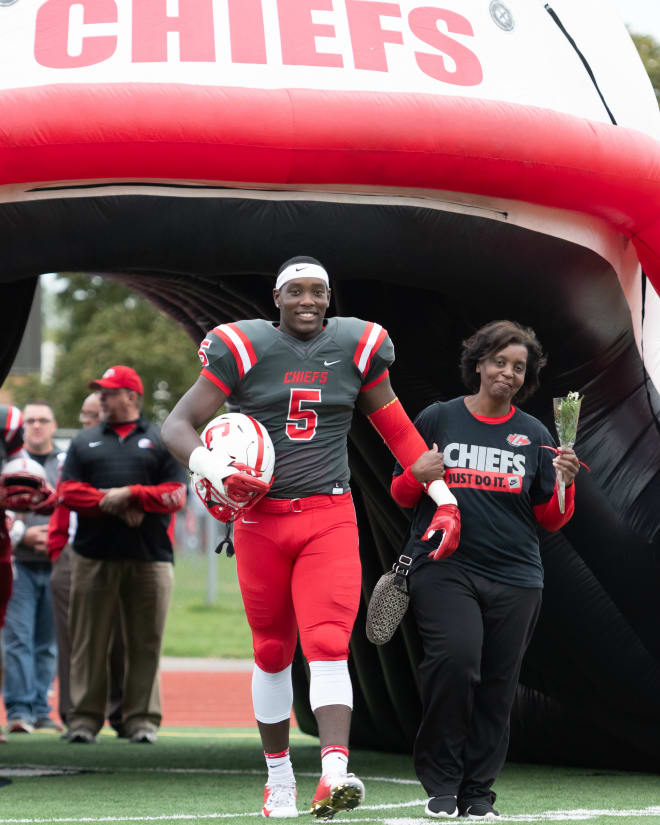 Darius with his mom, Valori, during Senior Day at Canton High School in 2018.