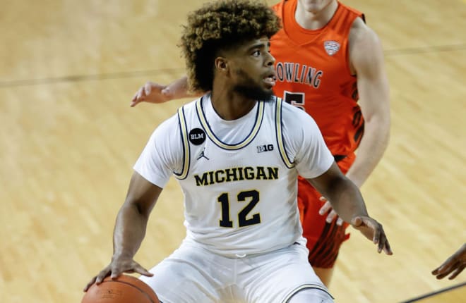 Michigan Wolverines Basketball point guard Mike Smith was impressive in his U-M debut.