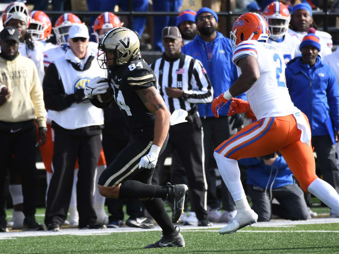 Nov 19, 2022; Nashville, Tennessee, USA; Vanderbilt Commodores tight end Justin Ball (84) runs for a first down after a catch during the second half against the Florida Gators at FirstBank Stadium.