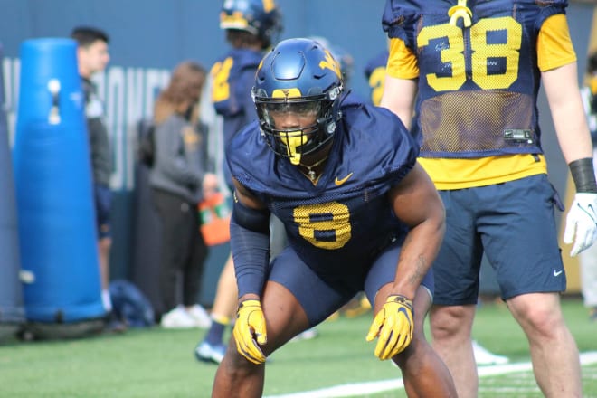 Linebacker Lee Kpogba works in practice on March 24.