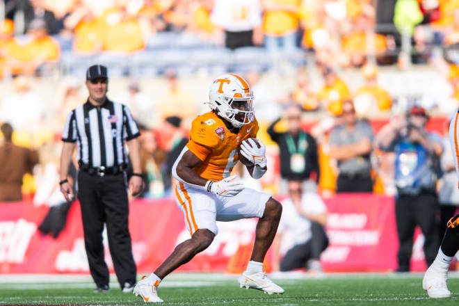 Jan 1, 2024; Orlando, FL, USA; Tennessee Volunteers running back Dylan Sampson (6) runs the ball against the Iowa Hawkeyes in the third quarter at Camping World Stadium.