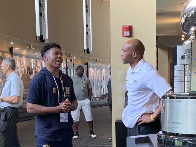 Curtis Whiting talking to Army CB Coach, Daryl Dixon