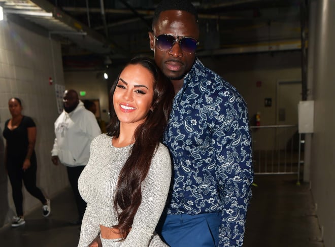 Former Clemson wide receiver Rod Gardner is shown here with his wife Leticia at the 2019 V-103 Winterfest in Atlanta, Ga.