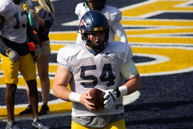 Frazier has moved to full-time center for the West Virginia Mountaineers football team.