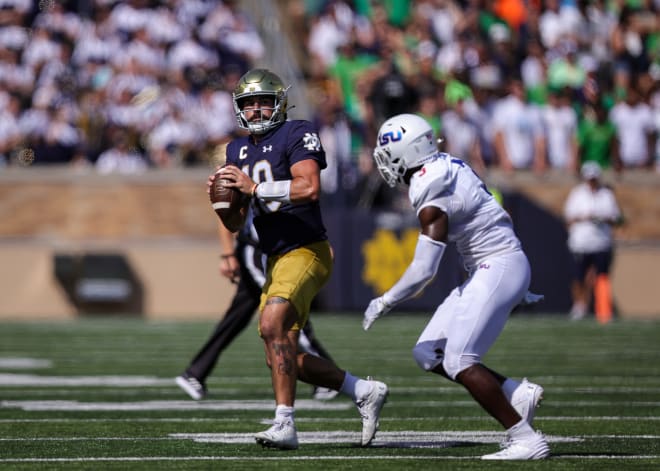 ND QB threw for 194 yards and two TDs and ran for a score before departing at halftime in ND's 56-3 romp over Tennessee State on Saturday.