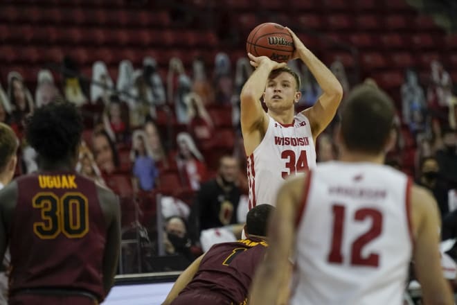 Brad Davison hits one of his four field goals, scoring 17 points in Wisconsin's win over Loyola