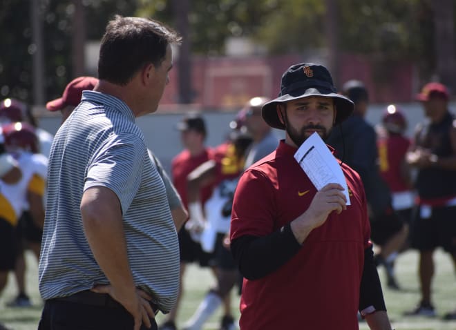 USC athletic director Mike Bohn, left, with Brandon Sosna.