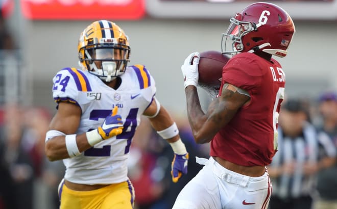 Alabama Crimson Tide wide receiver DeVonta Smith (6) pulls in a pass for touchdown against the LSU Tigers during the second quarter at Bryant-Denny Stadium. Photo | Imagn