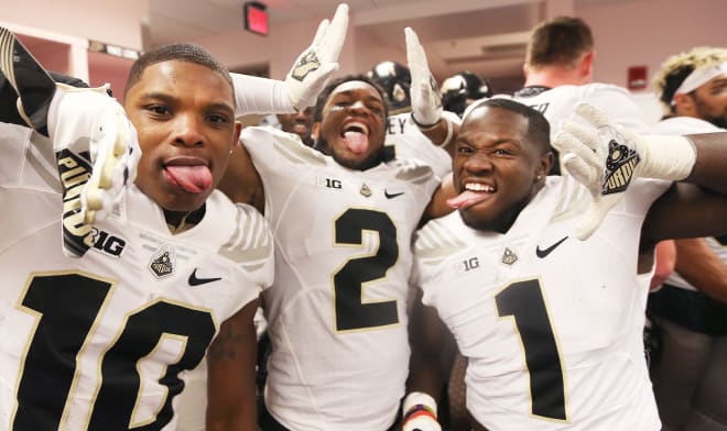 Greg Phillips, Da'Wan Hunte and D.J. Knox (from left to right) are Purdue football players who also are in Omega Psi Phi.