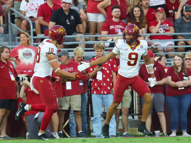 Seen here celebrating following a touchdown against Oklahoma, Jayden Higgins (right) and Benjamin Brahmer (left) have received high marks through seven games.