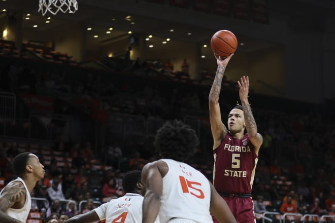 Green shoots a jumper against Miami