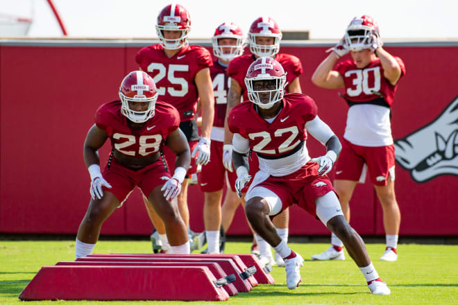 Deon Edwards (22) and Andrew Parker (28) received praise from Sam Pittman after Thursday's practice.