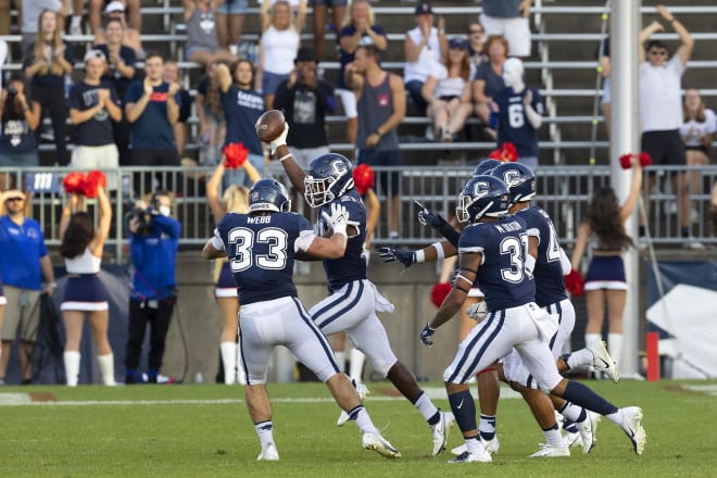 Connecticut cornerback Jeremy Lucien (ball in hand) received an offer from Vanderbilt on Thursday (Photo: Connecticut Athletics)