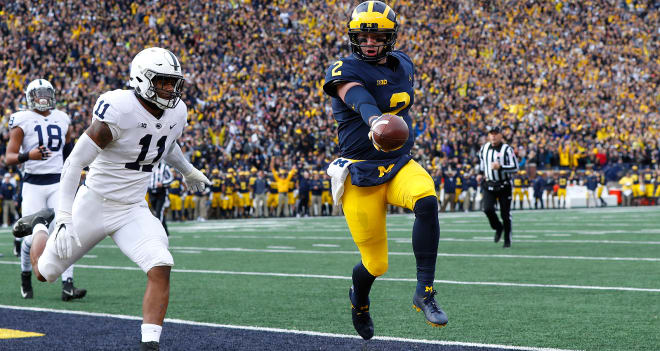 Michigan quarterback Shea Patterson scampers for a touchdown against Penn State. 