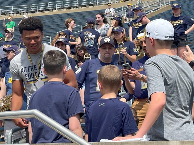 Keeley (far left) went into the stands before the Blue-Gold Game April 23 at Notre Dame Stadium to meet with fans. 