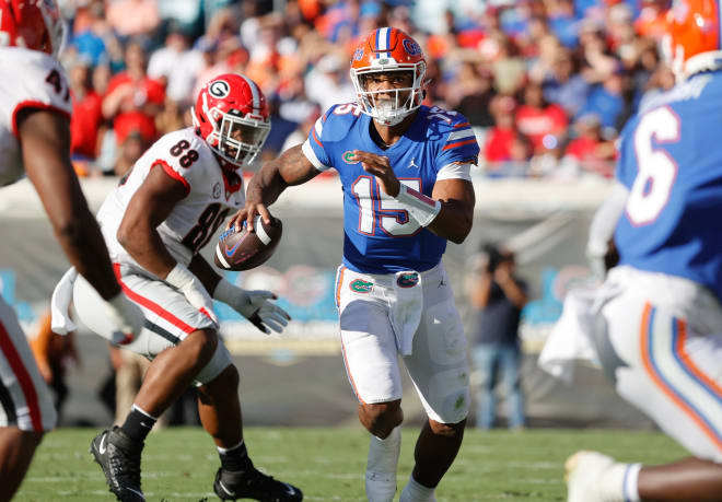 Oct 30, 2021; Jacksonville, Florida, USA; Florida Gators quarterback Anthony Richardson (15) runs out of the pocket against the Georgia Bulldogs during the first half at TIAA Bank Field. Mandatory Credit: 
