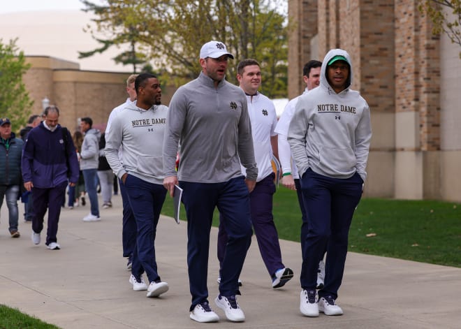 Notre Dame offensive coordinator Gerad Parker (left) has taken on coaching the Irish wide receivers after WRs coach Chansi Stuckey (right) was fired on Tuesday.