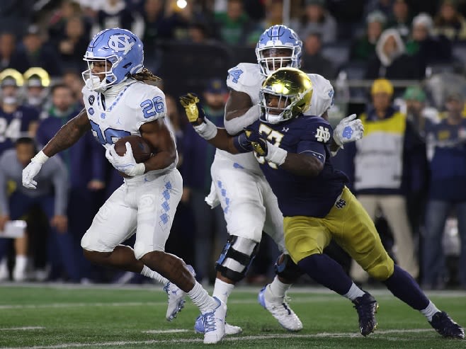 D.J. Jones (26) is one of six running backs battling for spots in the rotation as UNC is moves forward in fall camp.