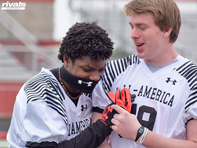 Lewis Cine (left) jokes with Rivals250 TE Austin Stogner at Sunday's Under Armour camp in Dallas