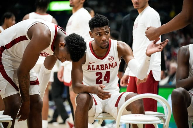 Alabama forward Brandon Miller (24) sits with his team during a time out during the championship SEC Men s Basketball Tournament game at Bridgestone Arena Sunday, March 12, 2023, in Nashville, Tenn. Photo | Andrew Nelles / The Tennessean / USA TODAY NETWORK