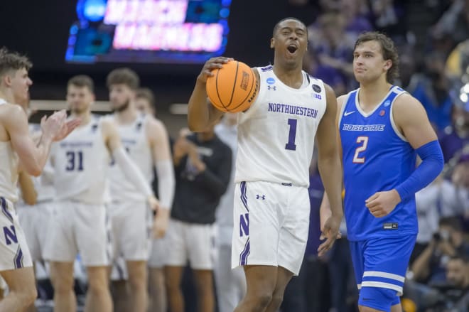 Chase Audige celebrates in the closing seconds of Northwestern's 75-67 win over Boise State in the first round of the NCAA Tournament.