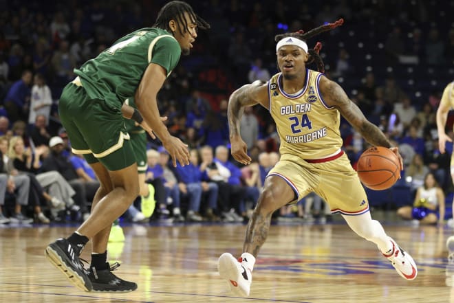 Cobe Williams drives the ball against a South Florida defender.