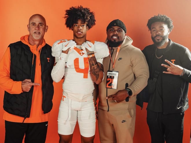 Courtland Guillory and his fateher accompanied by Willie Martinez (left) and Earnest Thomas III (right)