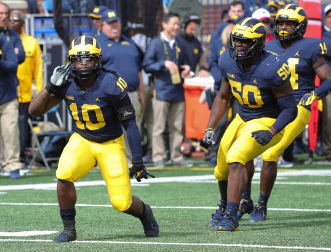 Devin Bush Jr. and his teammates will be listening for the sound of silence in the end on Saturday.