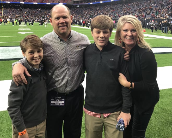 Barry Odom, his wife Tia, and their sons