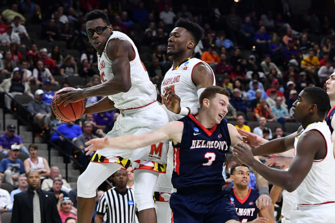 Jalen Smith (No. 25) grabs one of his 12 rebounds in the Terps' opening round win over Belmont.
