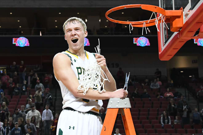 Happy days for Lincoln Pius X and their star senior guard, Charlie Easley (44), after the Thunderbolts go double overtime to win Class B.