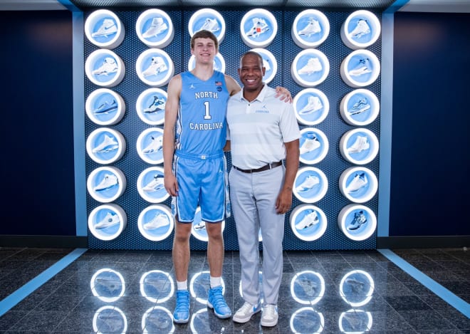 Isaac Traudt poses with Hubert Davis 